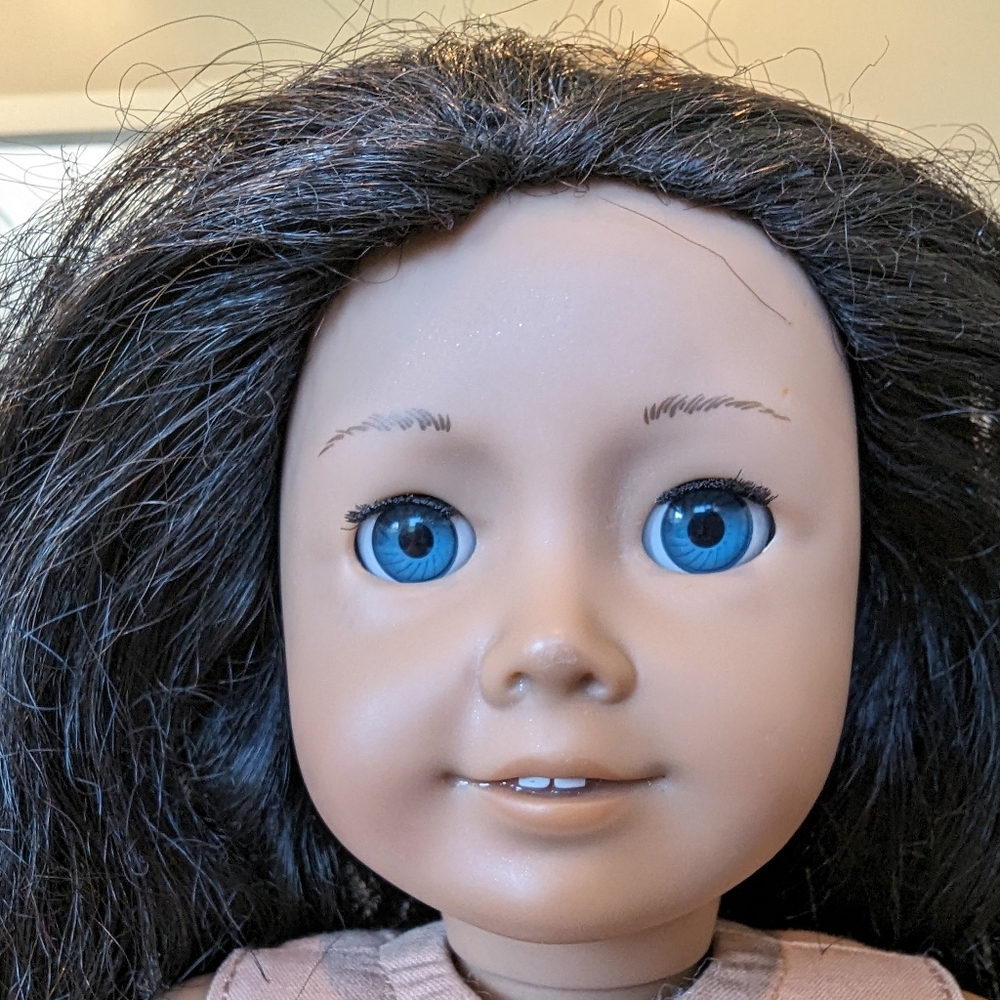 American Girl doll. Brown Hair, Blue eyes